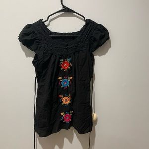 Black Cap Sleeve Blouse with Floral Accents